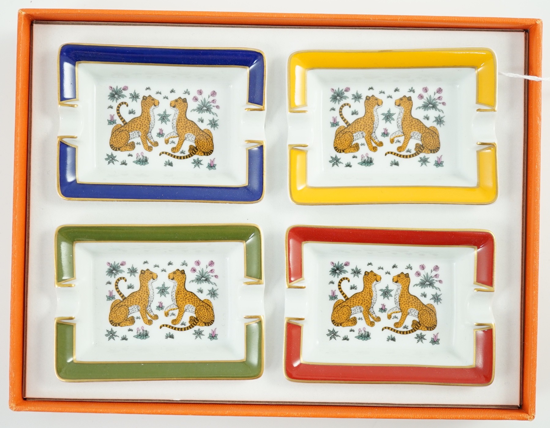 A boxed set of four Hermes porcelain ashtrays